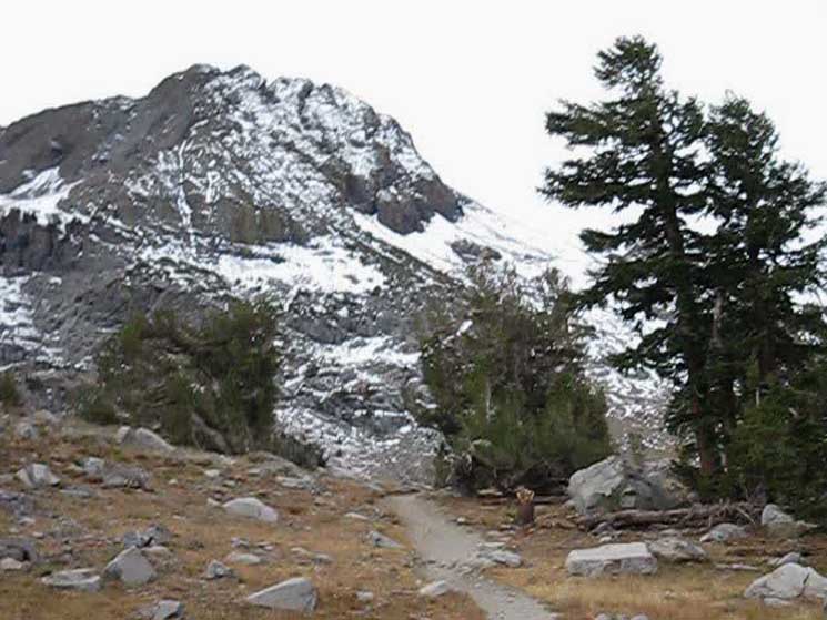 Backpacking closer to end of ridge protecting Winnemucca Lake.