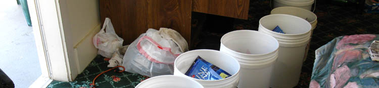 Filling each resupply bucket before repacking the food for backpacking