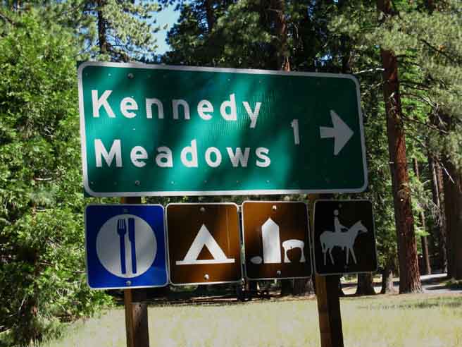 Road sign and miles to Kennedy Meadows at Highway 108 intersection.