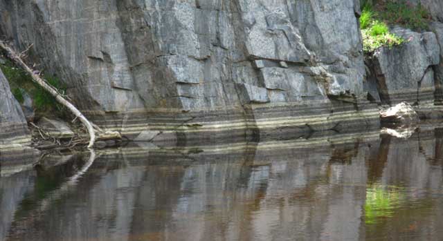 Detail of layers of waterline detailing shoreline rock.