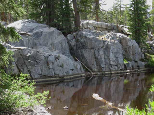 Rock on South side of lower black pond.