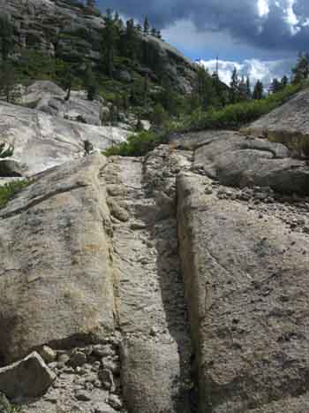 TYT through follows channel through granite.