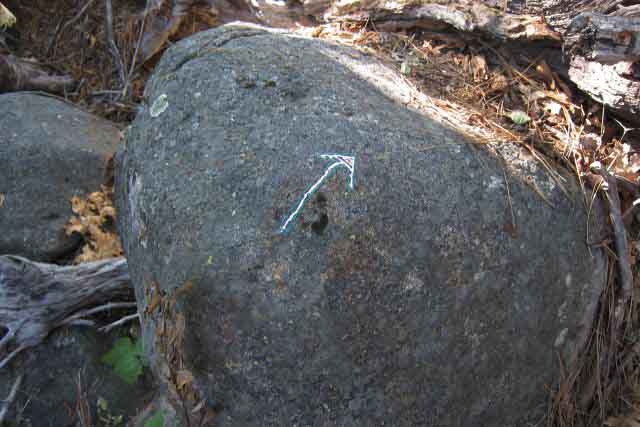Defacement of boulders approaching Lower Ford of Summit City Creek.