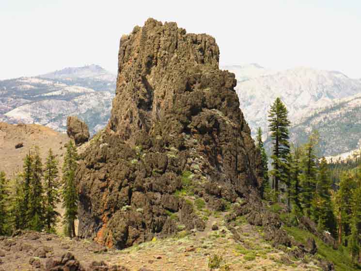 Volcanic tower rising off Mount Reba ridge line.
