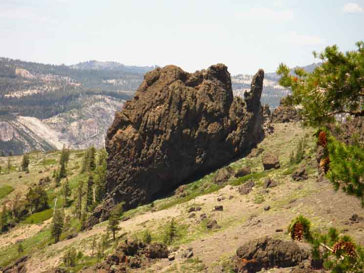 Great Volcanic boulder lays on Mount Reba ridge crest.