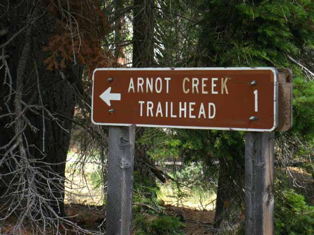 Road sign to Arnot Creek off of the Clarks Fork Road.