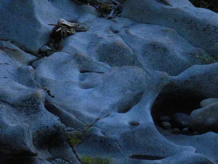 Sensual and strange shapes of Highland Creek Granite.