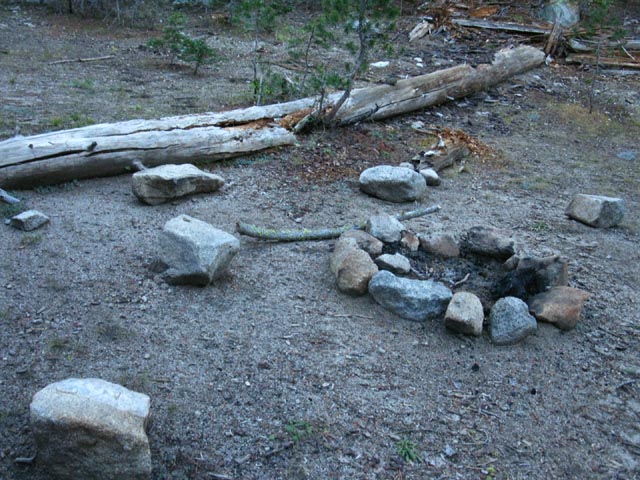 Firering and seats at North Stanislause River Campsite, Carson Iceberg Wilderness.