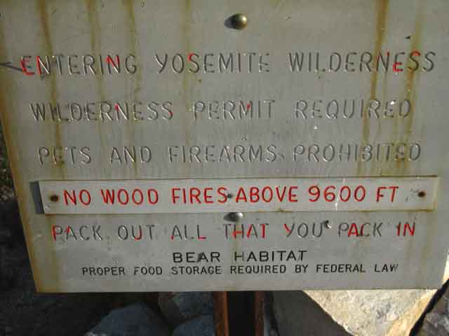 Close inspection of Yosemite National Park rules.