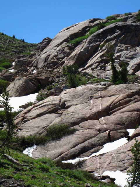 Granite on Southwest side of Brown Bear Pass, Volcanic on Northeast.