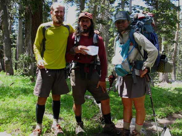 Dinnertime, Dingo and Mud take a moment's pause on the Pacific Crest Trail.