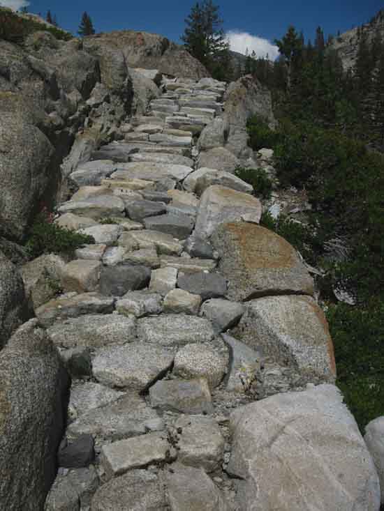 View of hard rock trail climbing towards Wilmer Lake.