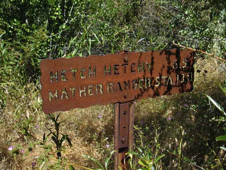 Yosemite Trail Sign: Hetch Hetchy trailhead distance from Rancheria Falls.
