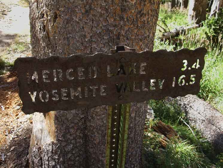 Babcock Lake trail junction miles sign to Yosemite Valley.