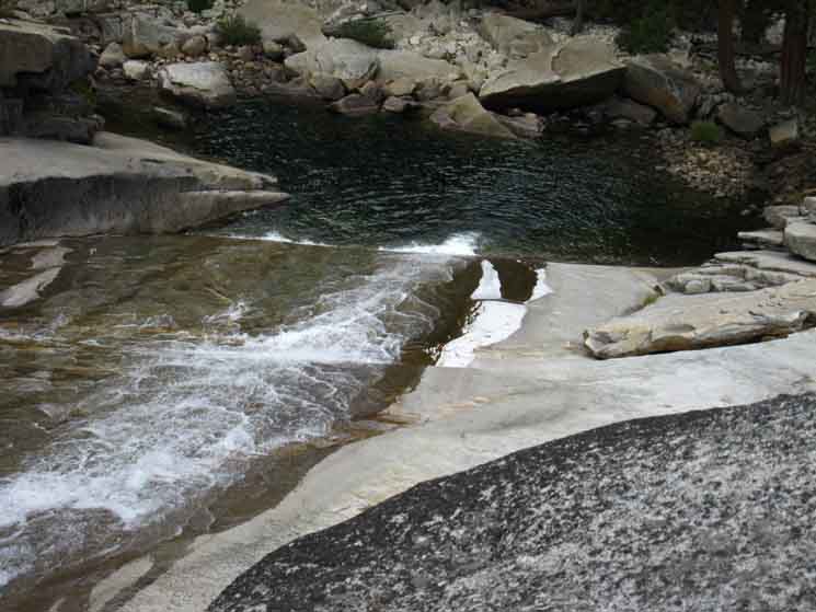 Pool in Bunnell Cascade along Merced River, backpacking Yosemite National Park.