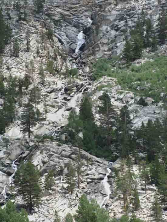 The creek tumbling down the sheer face of the East Flank of Amelia Earhart Peak into the very top of Lyell Canyon.