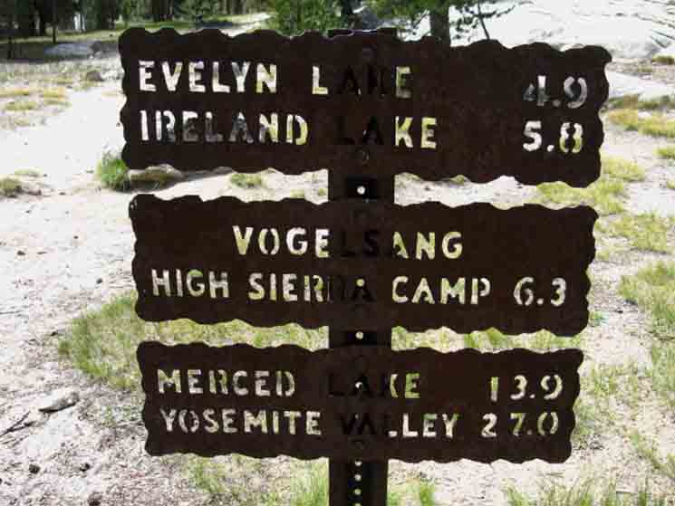 Miles sign at the trail junction leading to Vogelsang HSC via Ireland and Evelyn Lakes.