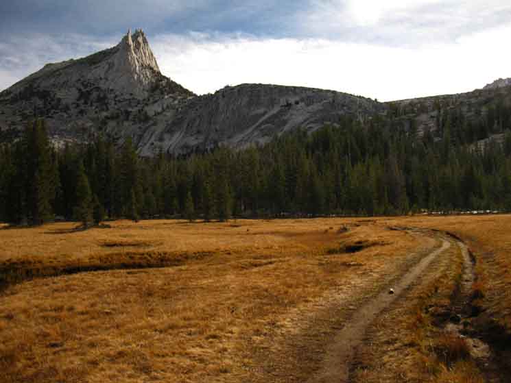 Inspecting Cathedral Peak as we hike West towards Cathedral Lake across its meadow apron.