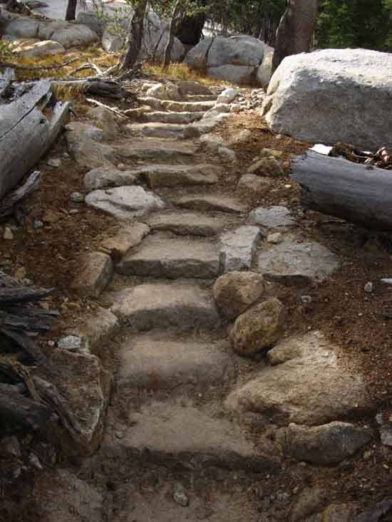 Granite stairs climbing towards Upper Cathedral Lake from Lower, Yosemite above Tuolumne Meadows.