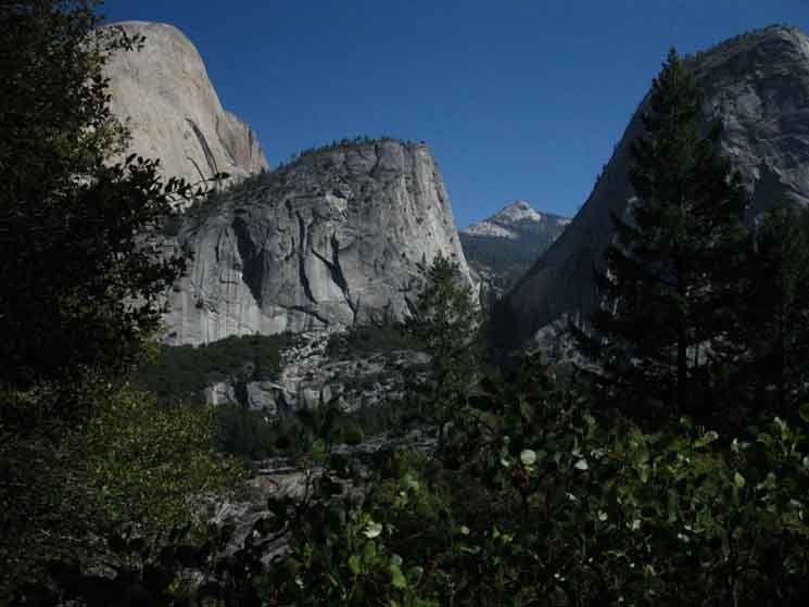 Clouds Rest visible between Mount Brodrick and Liberty Cap, with Half Dome towering above.