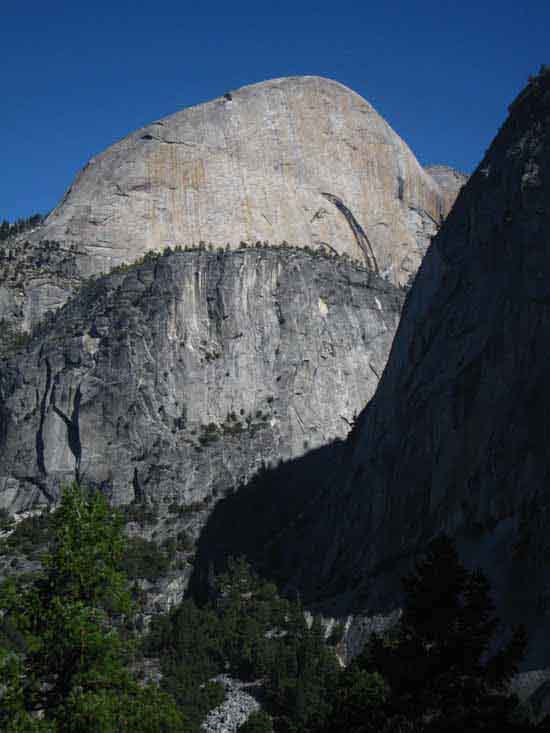 Liberty Cap towering over Mount Broderick, Half Dome over both of them.