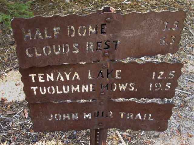 Sign pointing North along  John Muir Trail to Tuolumne Meadows from Little Yosemite Valley.