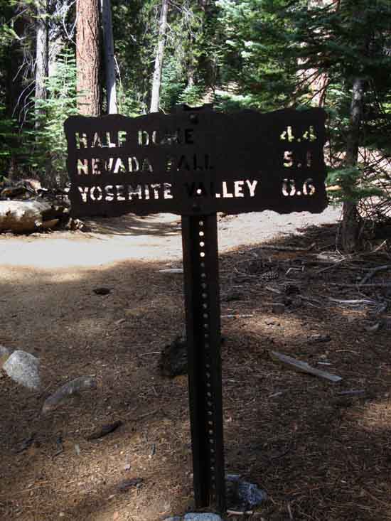 Miles sign down to Yosemite Valley from Merced Lake trail junction.
