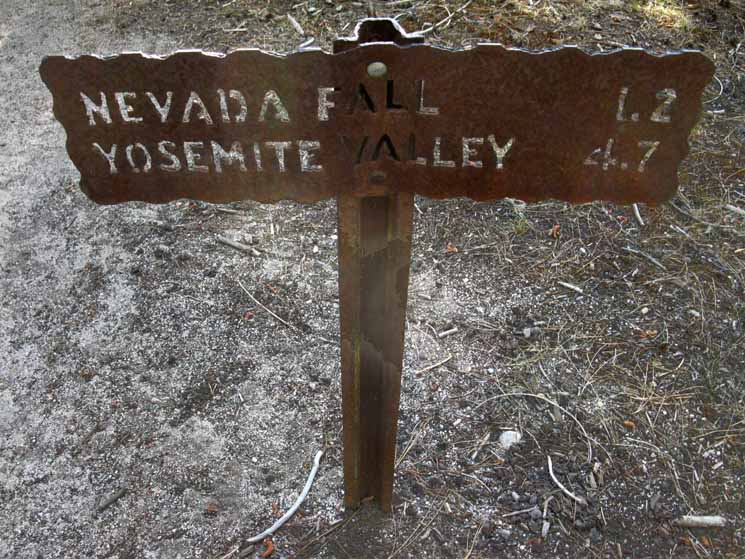 Sign of miles from Little Yosemite Valley into Yosemite Valley.