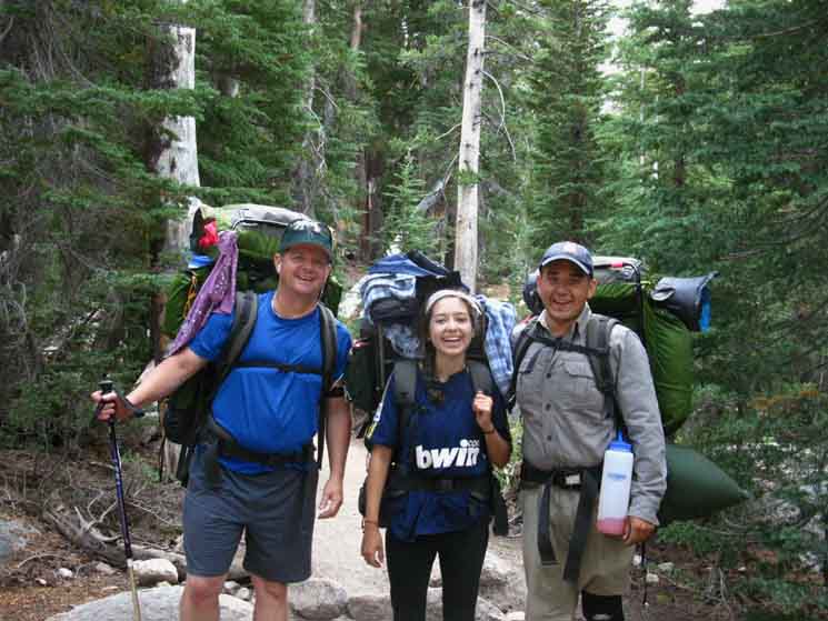 Three cool backpackers on the trail out of the heart of Yosemite.