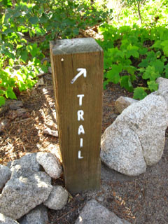 Marker keeps you off of trails heading down to vacation houses.