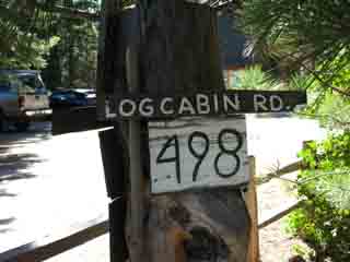 Log Cabin Road Sign as seen from hwy 89 South
